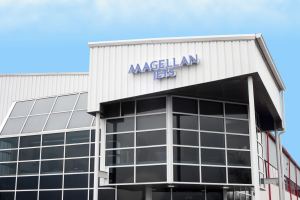 Hanscom Field Private Jet Terminal—The Magellan Jets sign over the company's new Private Terminal at KBED.