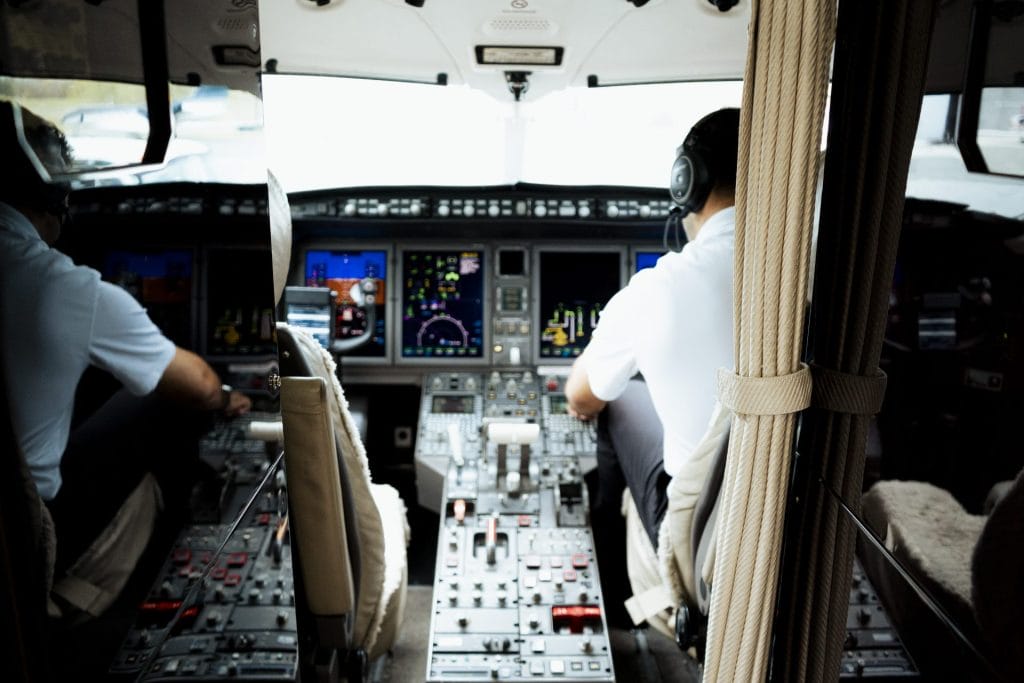pilots in cockpit
