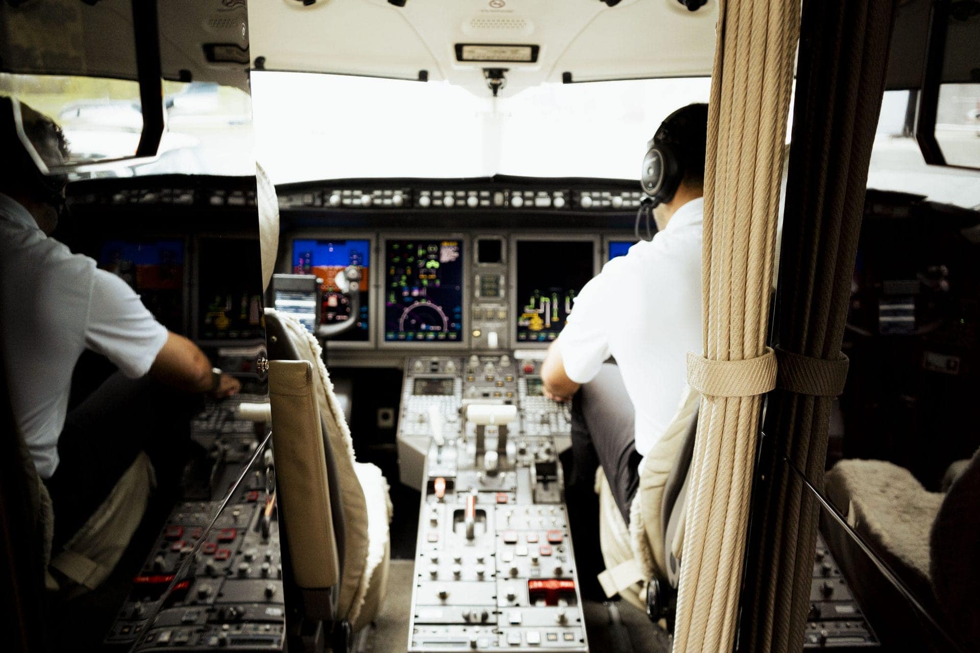 private jet pilot in cockpit