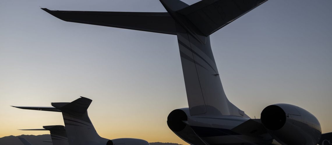 Tail section of Gulfstream Jets at sunset; learn about distressed air carriers