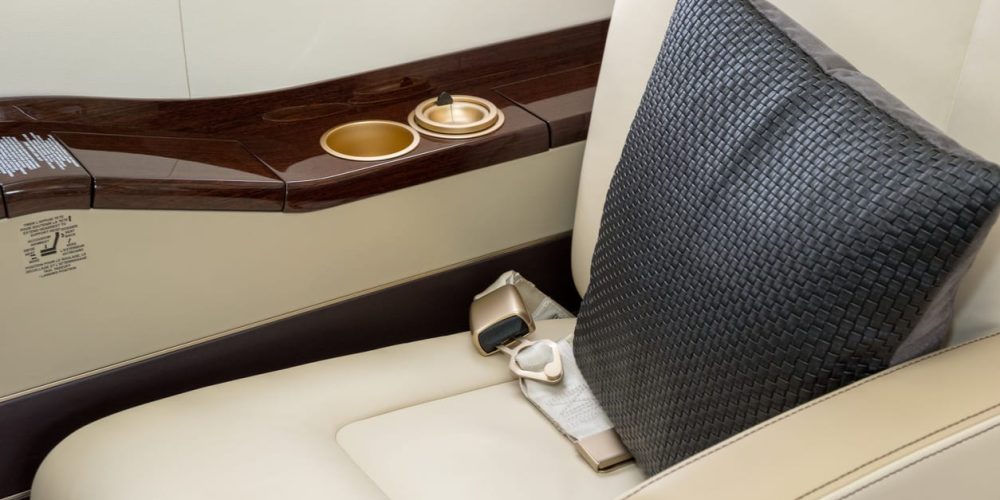 Comfortible chairs in a modern business jet airplane.
