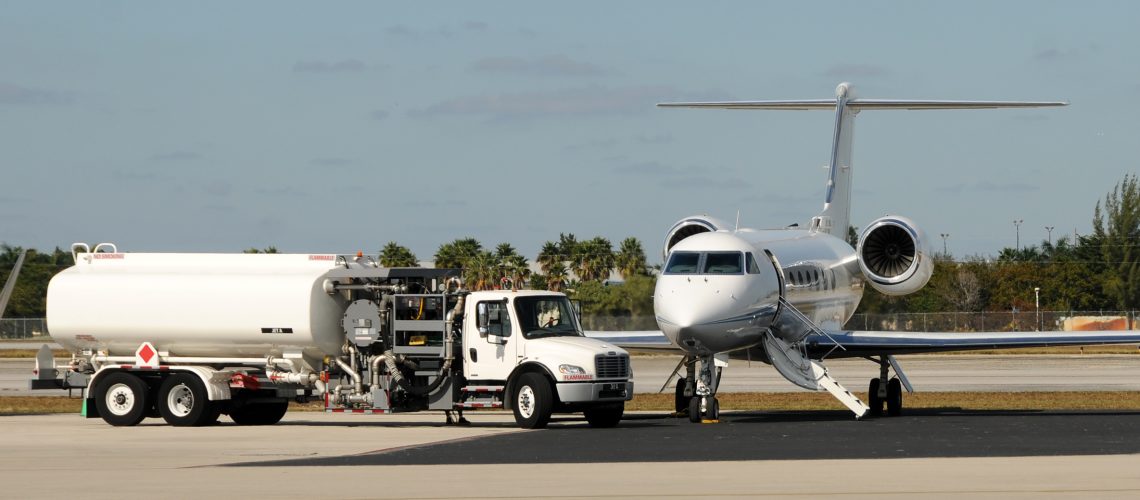 modern business jet refueling on the tarmac jet fuel