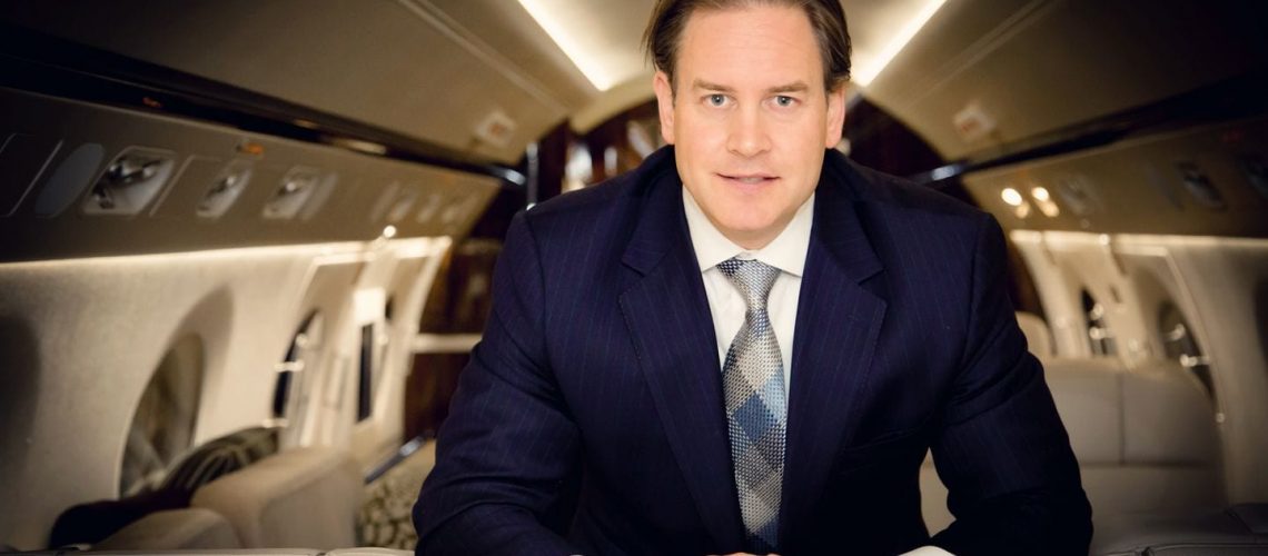 magellan jets ceo and founder joshua hebert aboard a private jet, he spoke with mirror review
