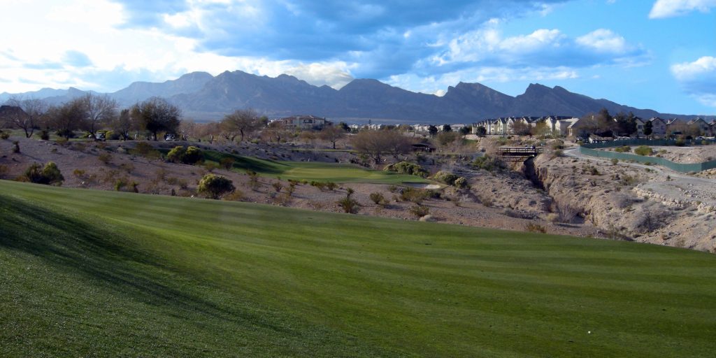 Playing golf in the Nevada desert encircle by the expression of nature